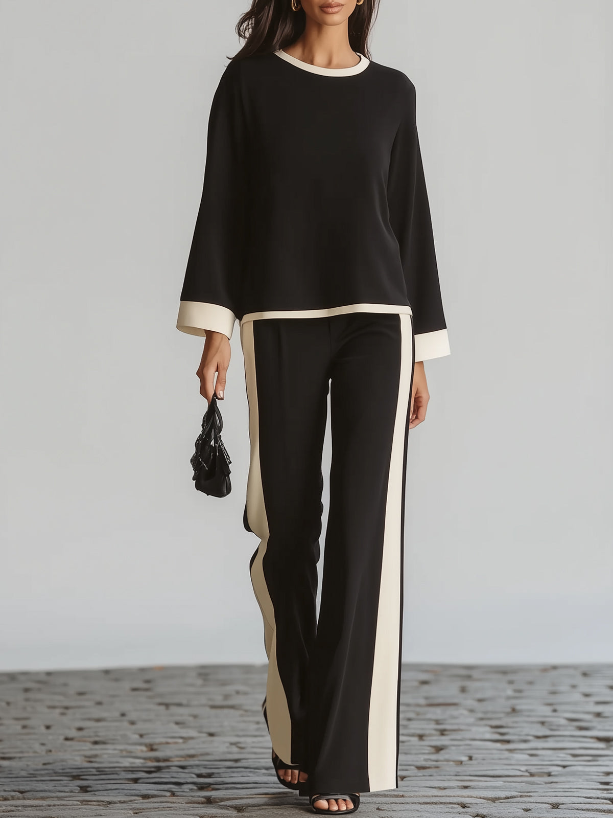 A Minimalist Commuter Set With Flared Sleeves And Side Stripes
