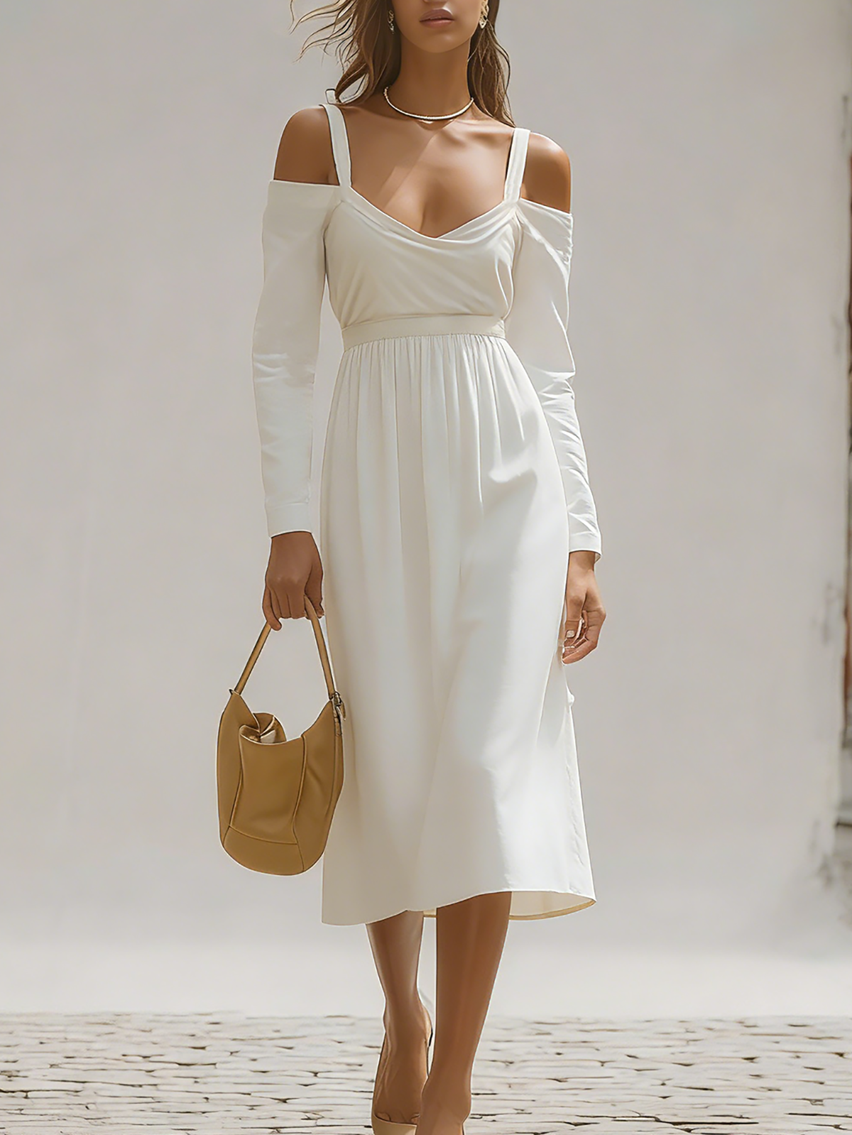 Chic Ivory Dress With Spaghetti Straps And Flowy Skirt